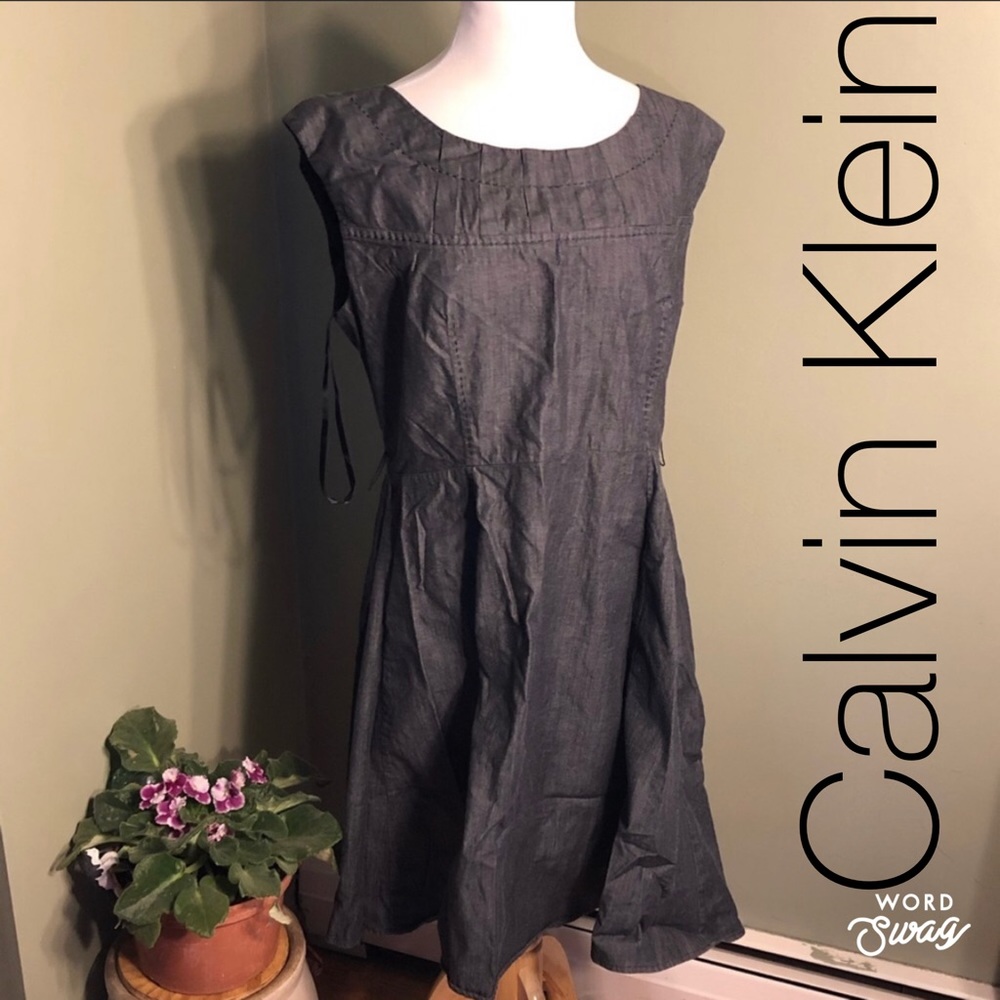 14 Calvin Klein dress. Charcoal gray. Sleeveless.